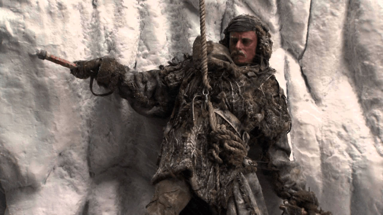 Game of Thrones S3E6 "The Climb" episode guide image showing two climbers scaling a steep icy wall on ropes in freezing wind
